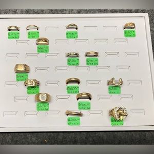 Various mens 10kt gold rings.